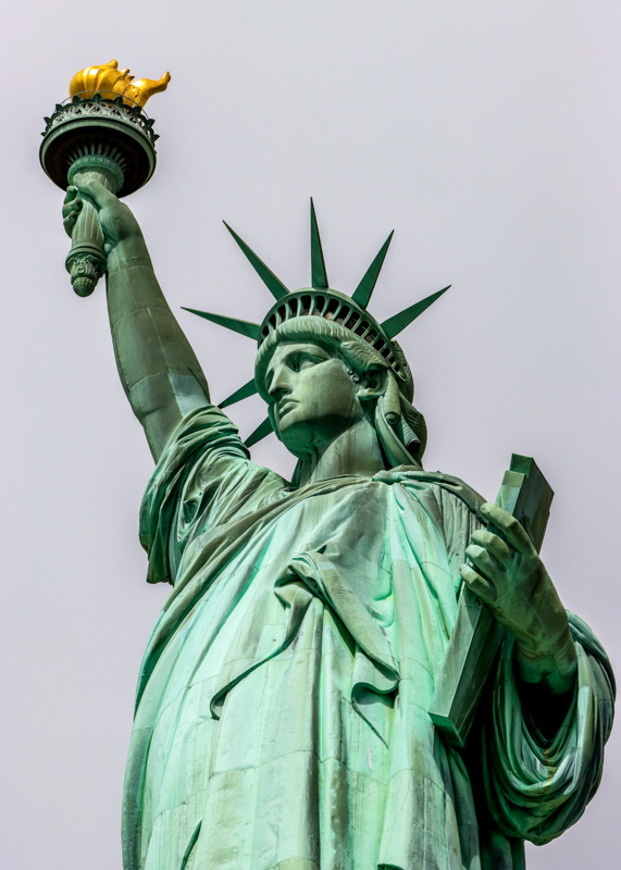 Side view of the upper half of the Statue of Liberty in Statue of Liberty NM