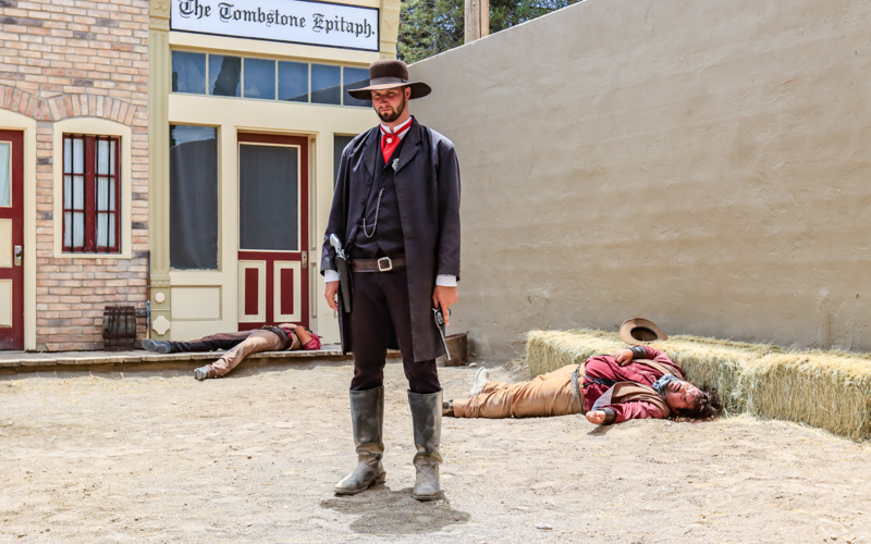 Wyatt Earp, unscathed, with Billy Clanton and Tom McLaury dead after the Gunfight at the OK Corral