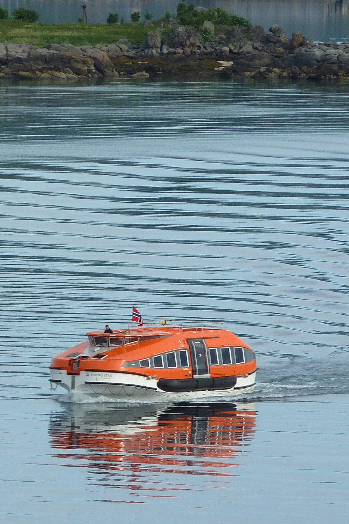  Tender boat waiting to pick up passengers