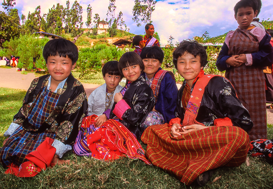 Girls Relaxing Outside Wangdi Dzong