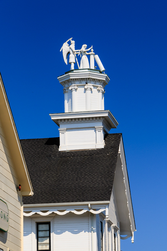 Bank building - statue - Time and the Maiden