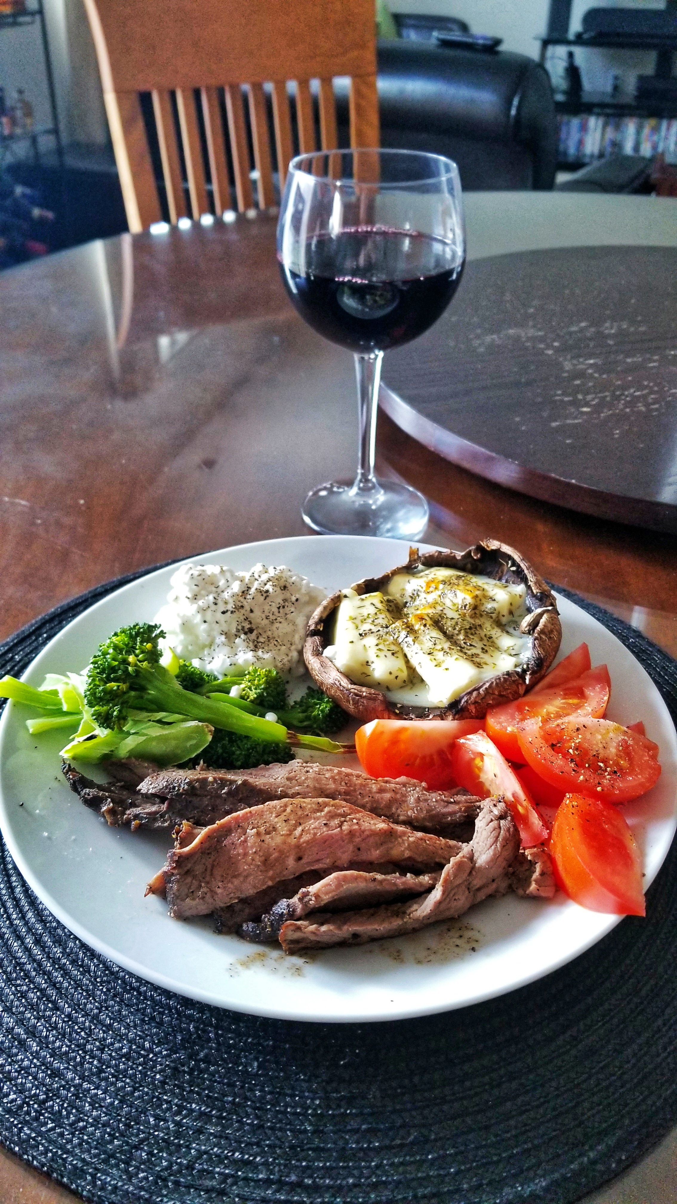 Sirloin Roast, Portobello Mushroom with Cheese, Cottage Cheese, Broccoli, Tomatoes & a tasty red wine.