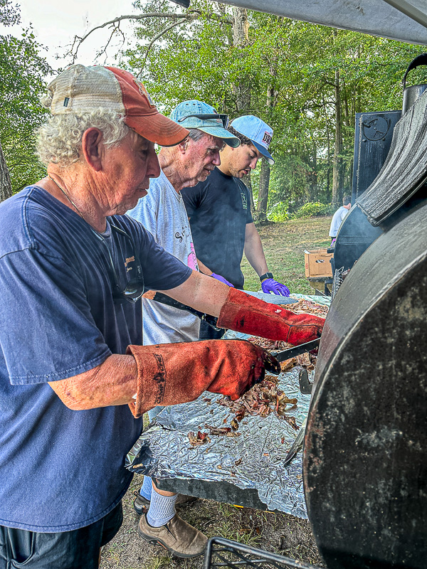 2024 07 06 Johnny, Steve, Josiah unloading the smoker i6795