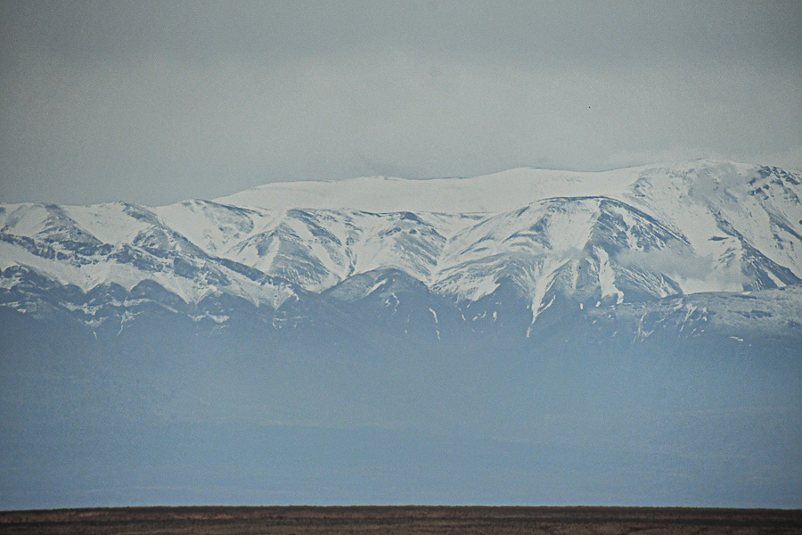04 02 Atlas Mountains looming over a barren landscape Moroc-4032