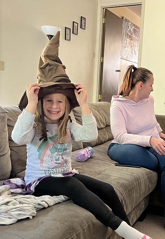Sisters Turn In the Sorting Hat