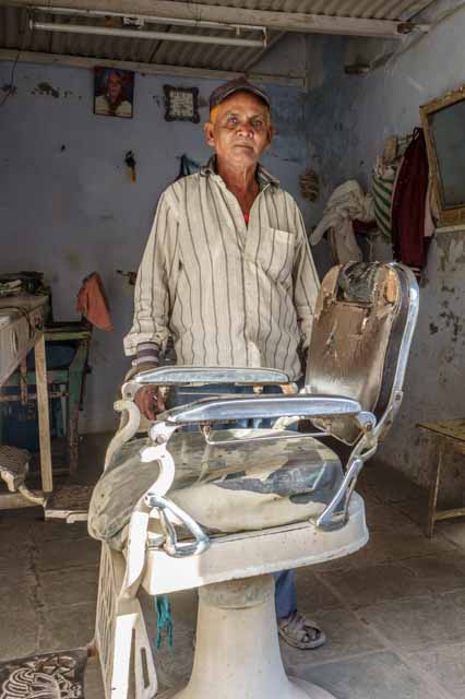 Barber in His Shop