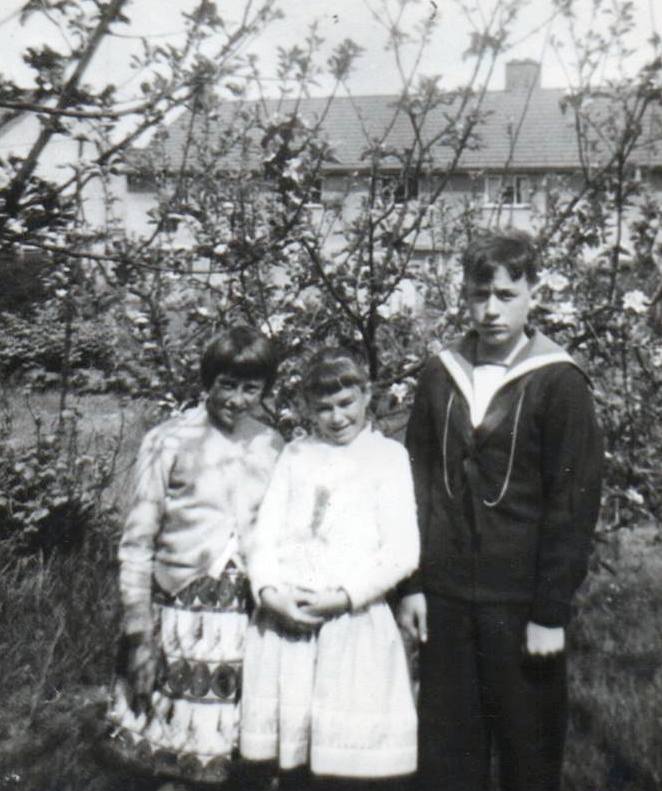 1962 - WILLIAM THORNHAM, MUM INSISTED POSING WITH MY SISTERS.jpg
