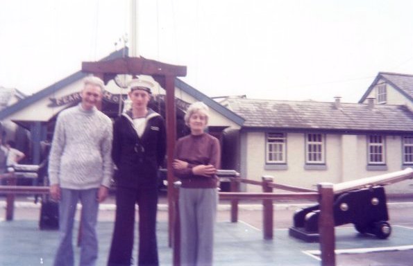 1976, 8TH JUNE - PETER FULLARTON, AFTER LAST PASSING OUT PARADE AT GANGES,DAD, MYSELF AND MUM ON QUARTERDECK..jpg