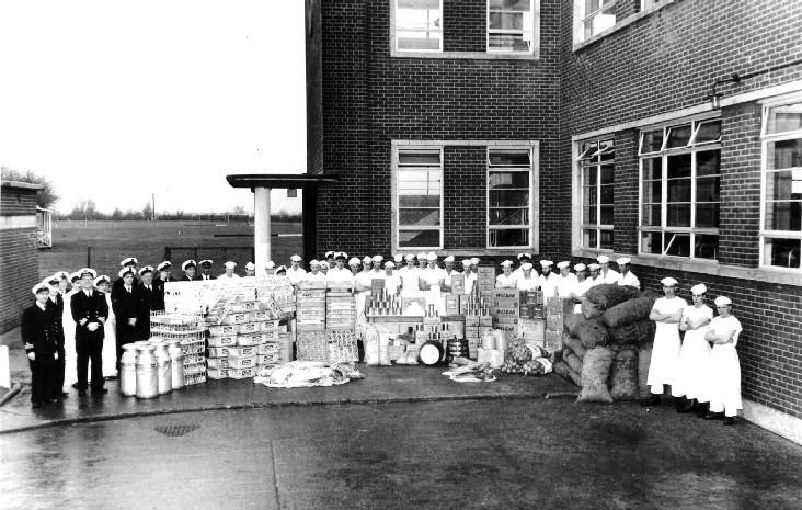 1950s - SHOWING THE CMG STAFF AND ONE DAY'S SUPPLIES.jpg