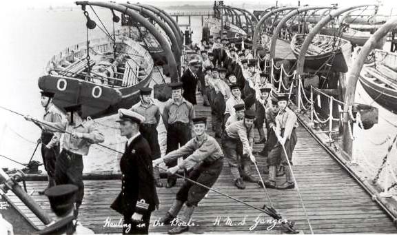 UNDATED - HAULING IN THE BOATS ON THE PIER.jpg