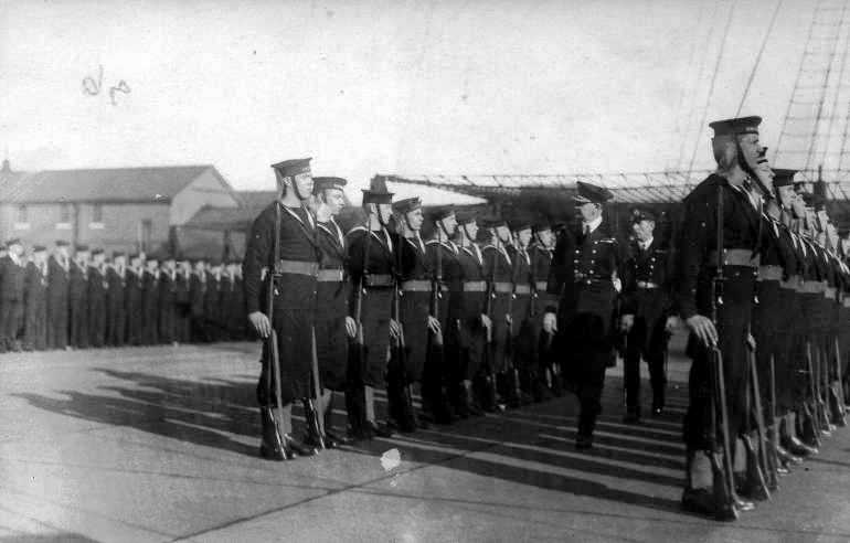 1933-34 - DIVISIONS, GUARD BEING INSPECTED BY AN ADMIRAL.jpg