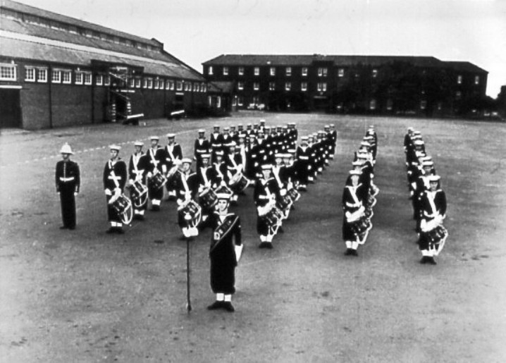 UNDATED - THE BUGLE AND DRUM BAND ON THE PARADE GROUND.jpg