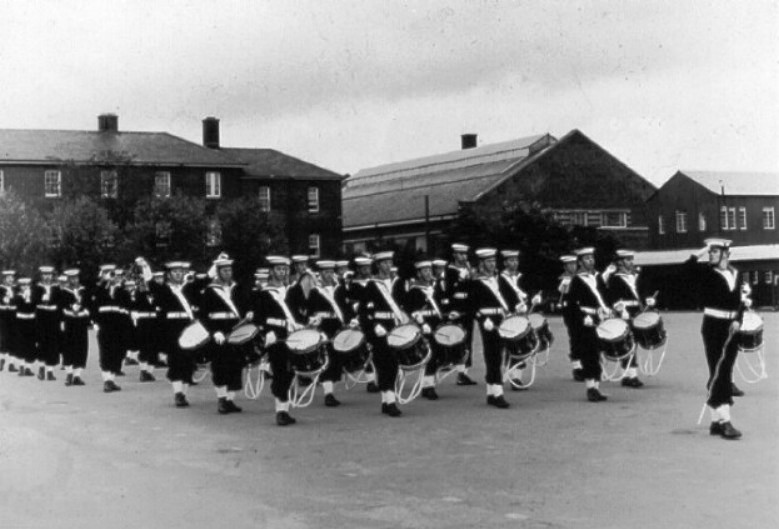 UNDATED - DICKIE DOYLE, THE BAND MARCHING PAST.jpg