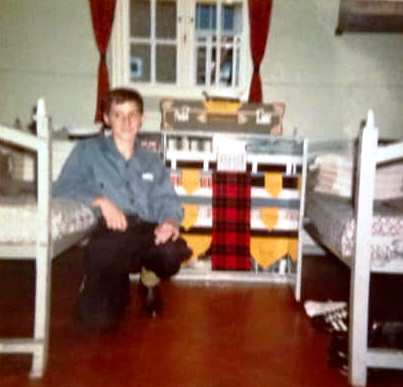 1972, APRIL-JULY - STUART LUCAS, R.O. [G], CROUNCHING BY HIS LOCKER WHICH IS DRESSED OVERALL.jpg