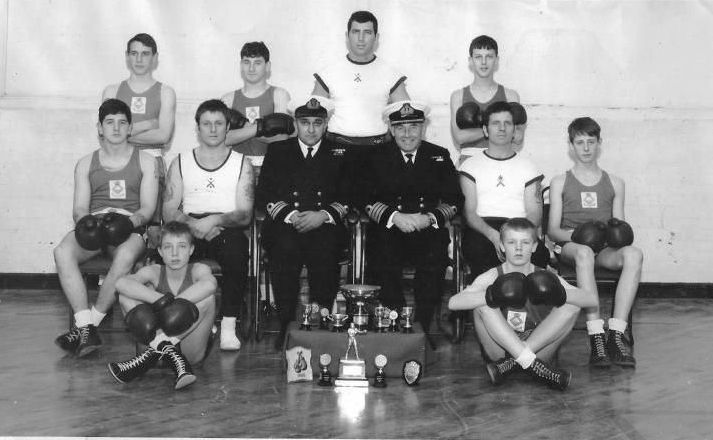 UNDATED - BOXING TEAM WITH CAPTAIN OF GANGES AND BOXING TROPHIES.jpeg