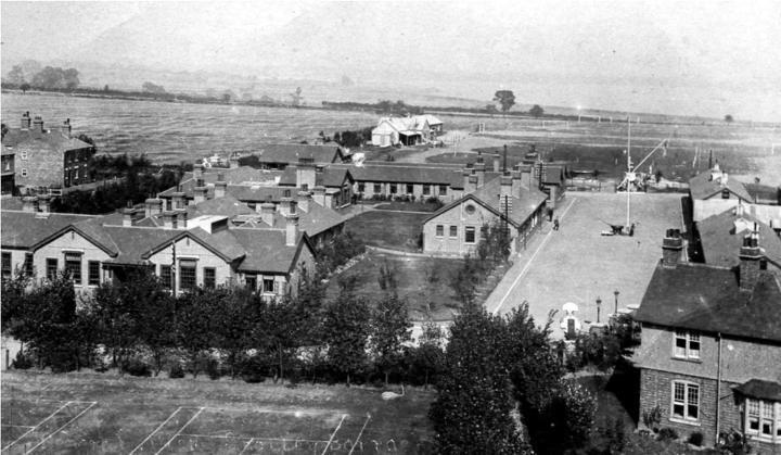 PRE 1907 - AERIAL VIEW OF THE Q.D. AND PARADE GROUND BEFORE IT WAS SURFACED AND THE TRAINING MAST STEPPED.jpg