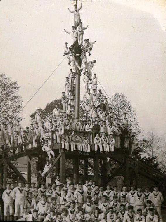 UNDATED - BOYS ON ONE OF THE TRAINING MASTS, USED FOR SIGNAL & SWINGING THE LEAD TRAINING.jpg