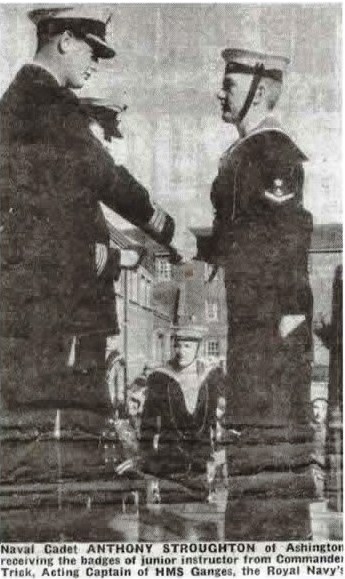 1979 - ANTHONY STROUGHTON, RECEIVING JUNIOR INSTRUCTOR'S BADGE FROM THE COMMANDER
