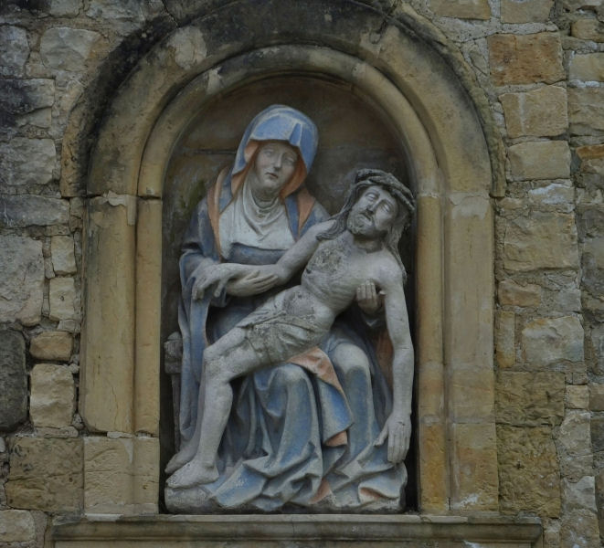  Religious decoration on gateway Rue Treves Grund