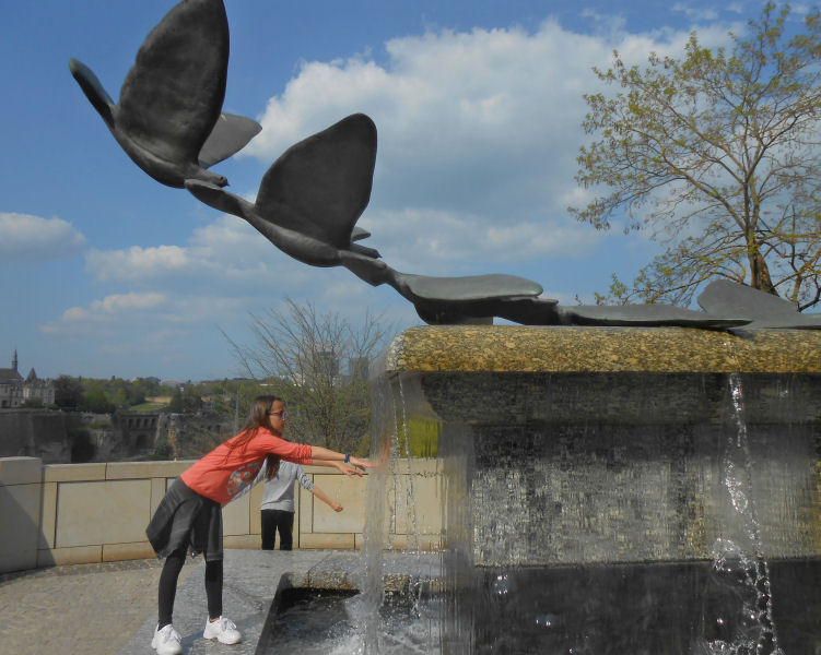  Flying birds fountain by Courts area 