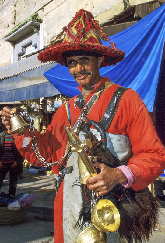 Traditionally-garbed waterseller in the souk in Meknes