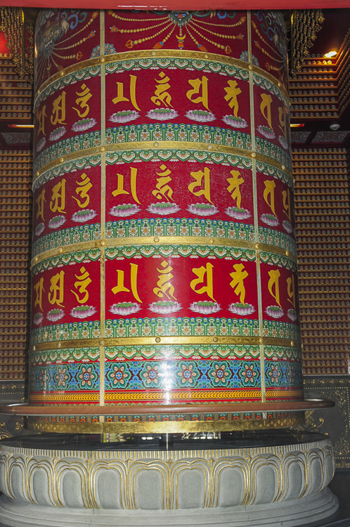 A giant ceramic prayer wheel at the Buddha Tooth Relic Temple