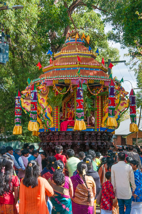 With the deity enthroned, the chariot begins its journey