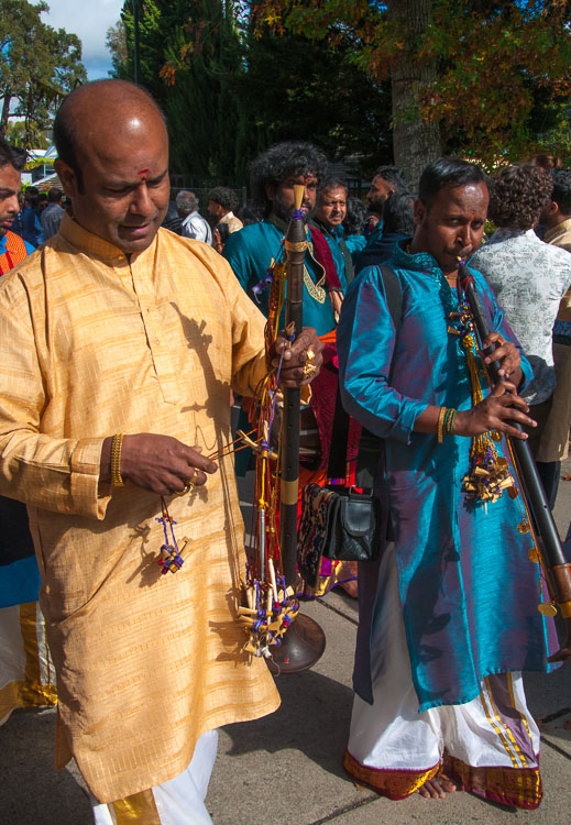 Musicians performing amongst the Hindu congregation