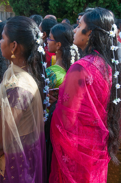 The womens richly-coloured saris add to the explosion of colour