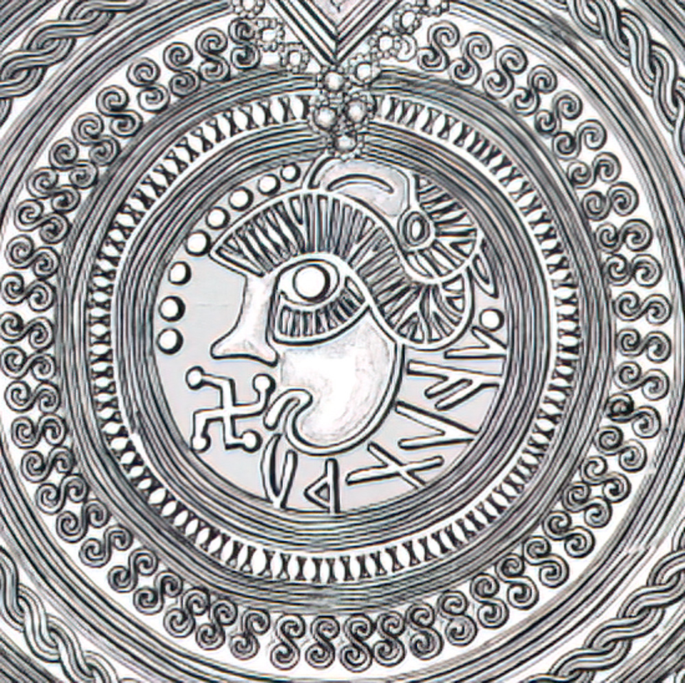 Geltorf (Schleswig-Holstein, German) bracteate head design (IK 255) showing stylistic parallels with the Brinton bracteate head 