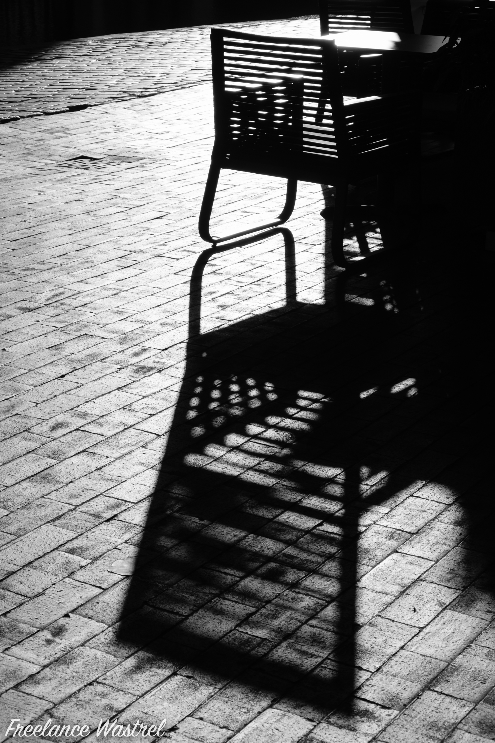 Shadow of an empty chair