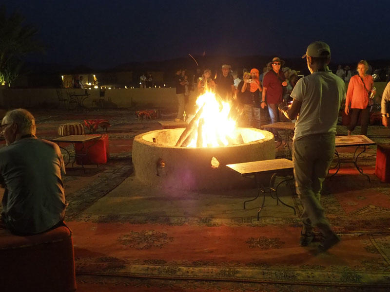 Fire pit at entrance to restaurant in the desert