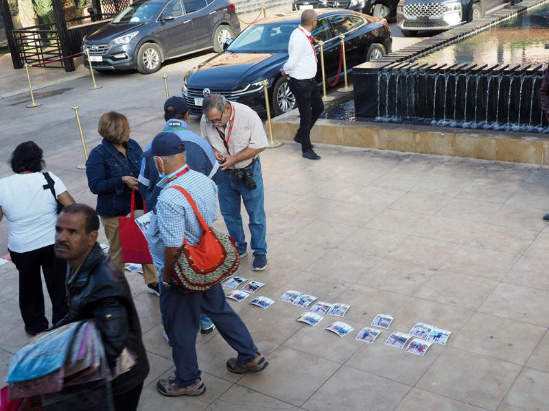 Selling pictures of us taken the previous day