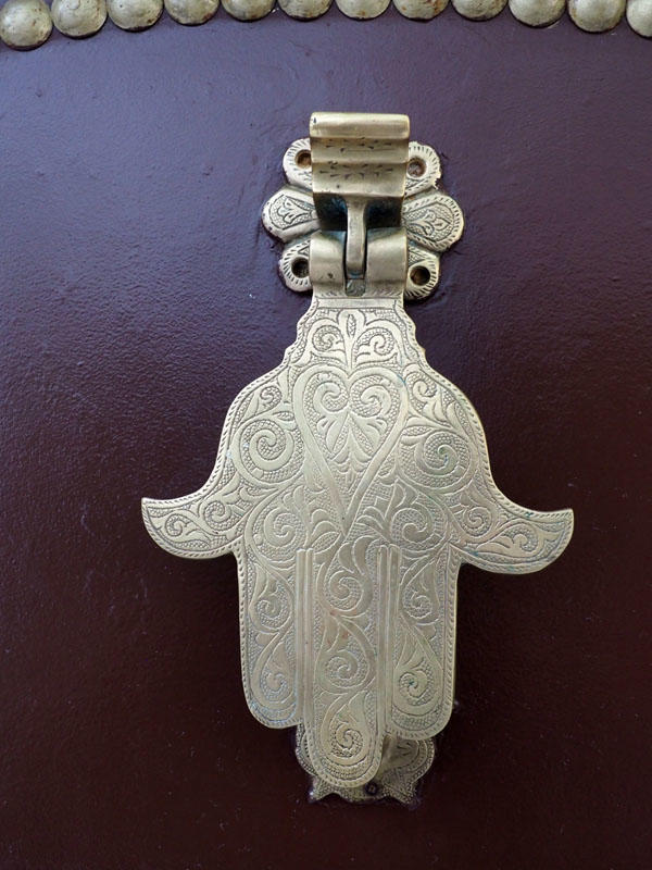 Hand of Fatima knocker on a doorway