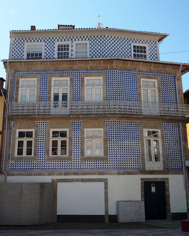 A building lined with azulejos