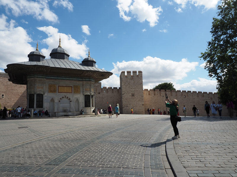 Taking a picture of the entrance to Topkapi Palace