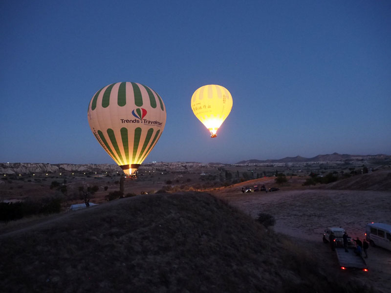 Before sunrise - blowing hot air into the balloon