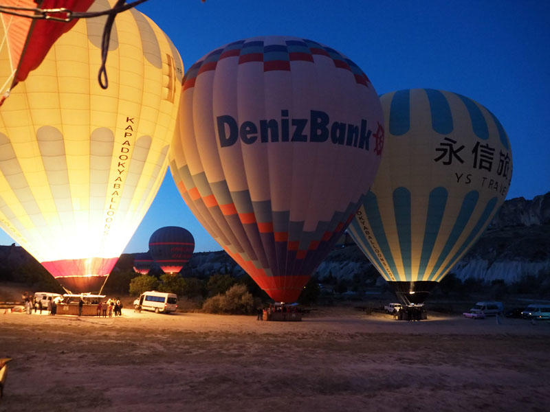 Before sunrise - blowing hot air into the balloon