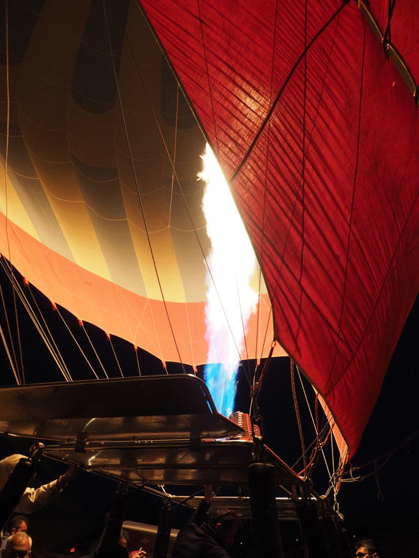 A burner firing up in the balloon