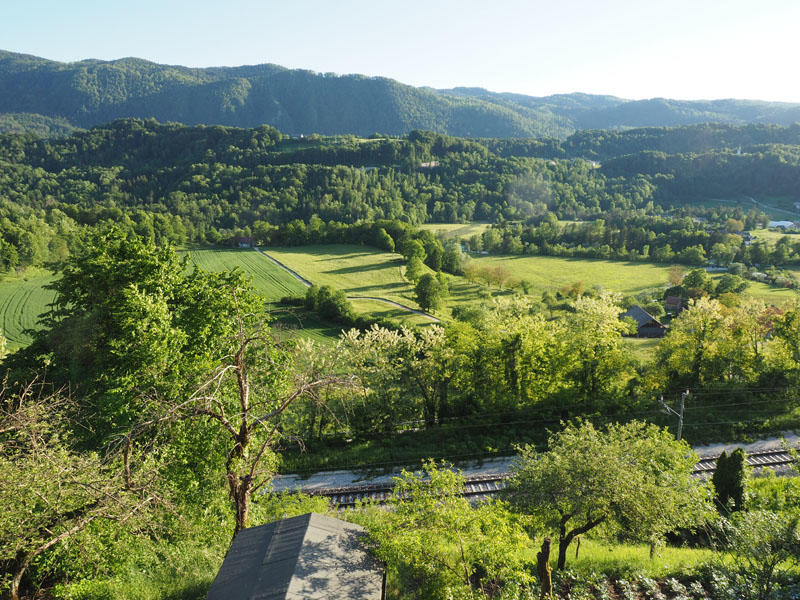 View below of a plain below the town through which the Sava river flows