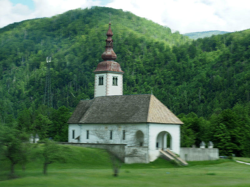 Driving past a church in the countryside