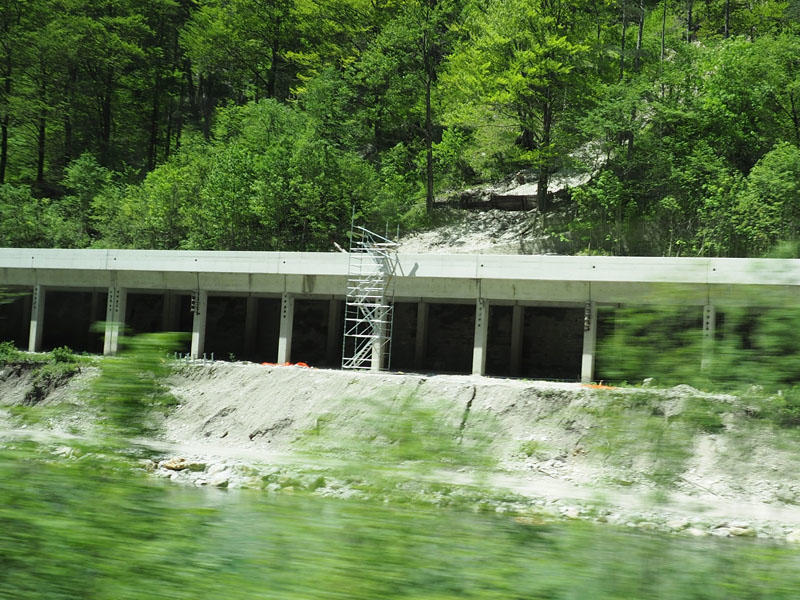 Minor landslide over the protective cover of the railroad tracks