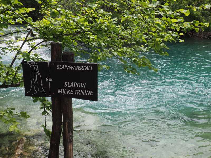 Sign for waterfall between two lakes