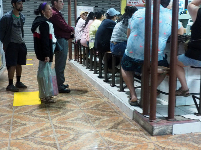 Waiting for a seat at a Costa Rican soda