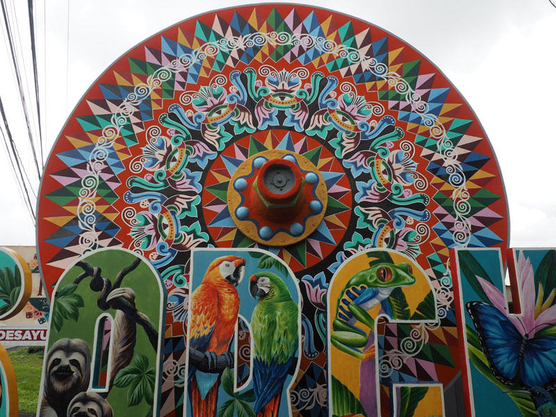 Ox cart wheel at the entrance to the store