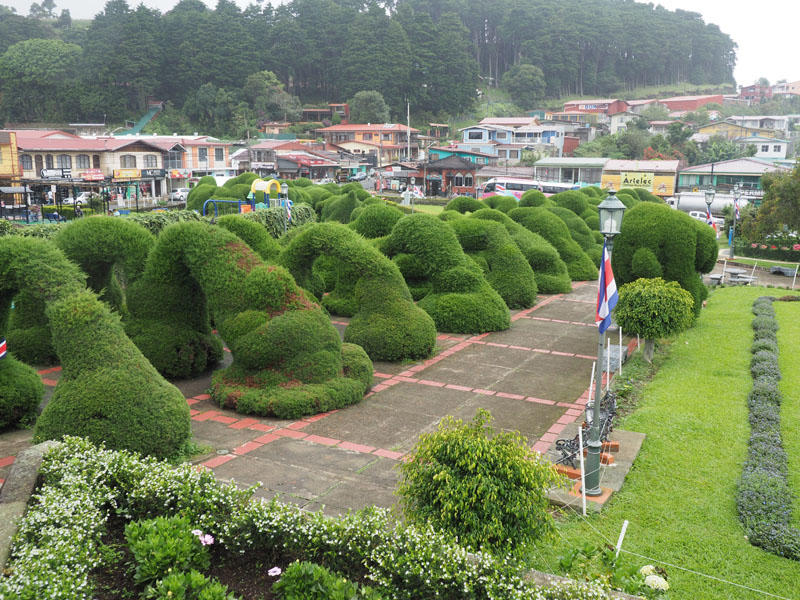 Garden with topiary in front of the church
