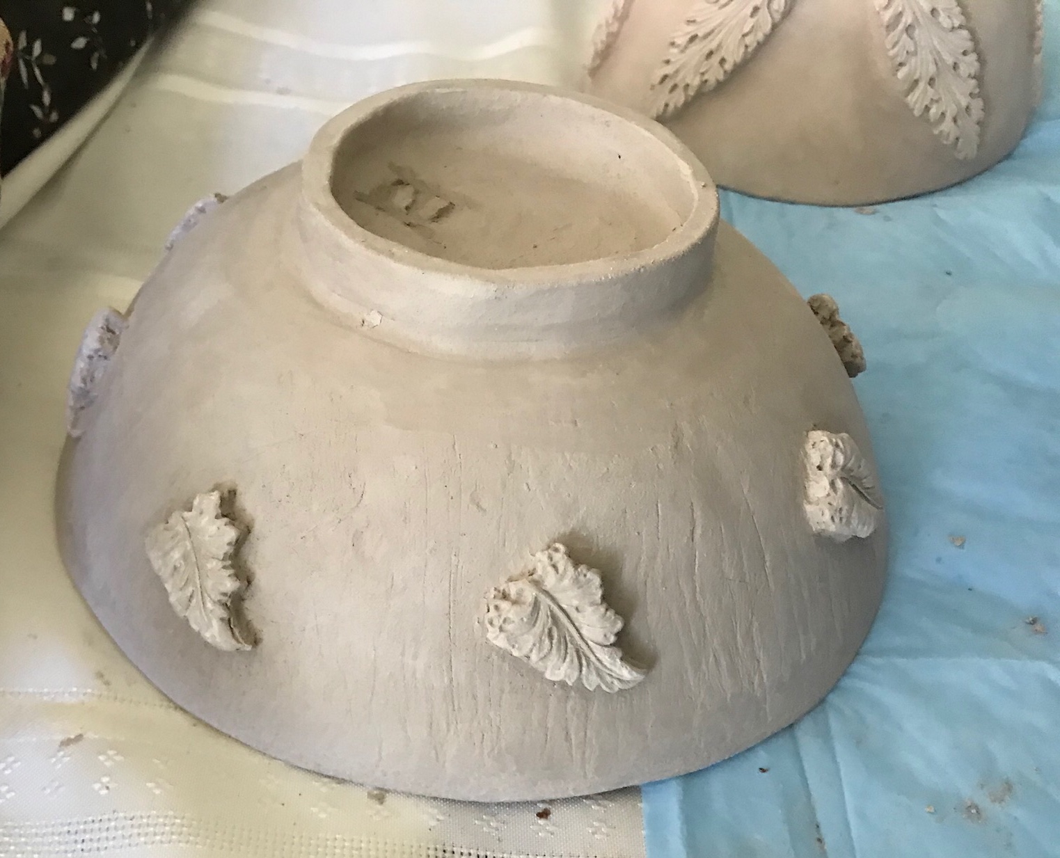 slab bowl with attached leaf design