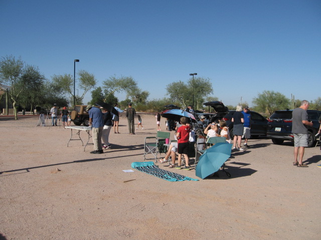 An array of visitors at the parking lot across from Leslie Pool Supplies