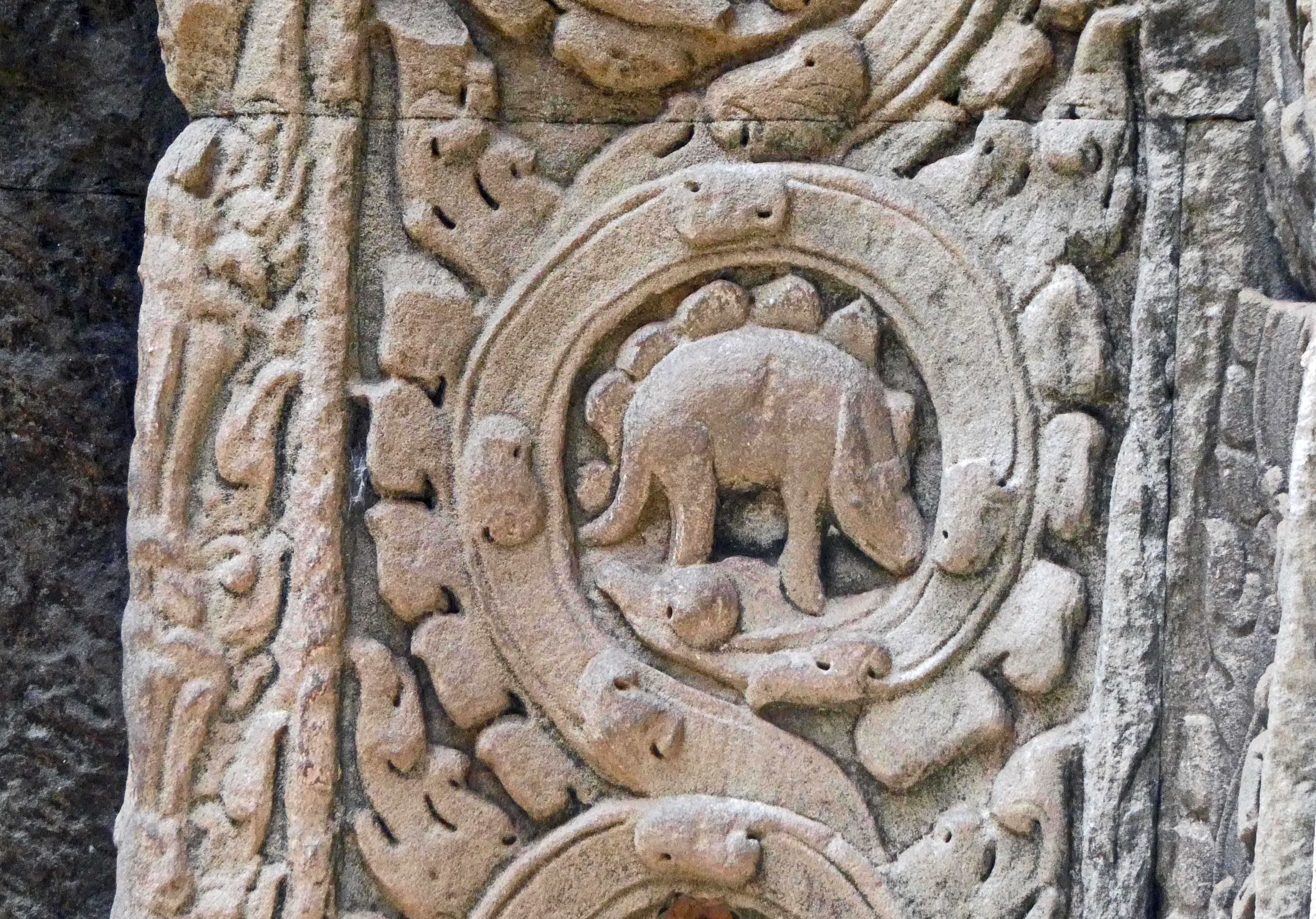 Carving of what appears to be a Stegosaurus at Ta Prohm Temple (12th Century) is the subject of much debate
