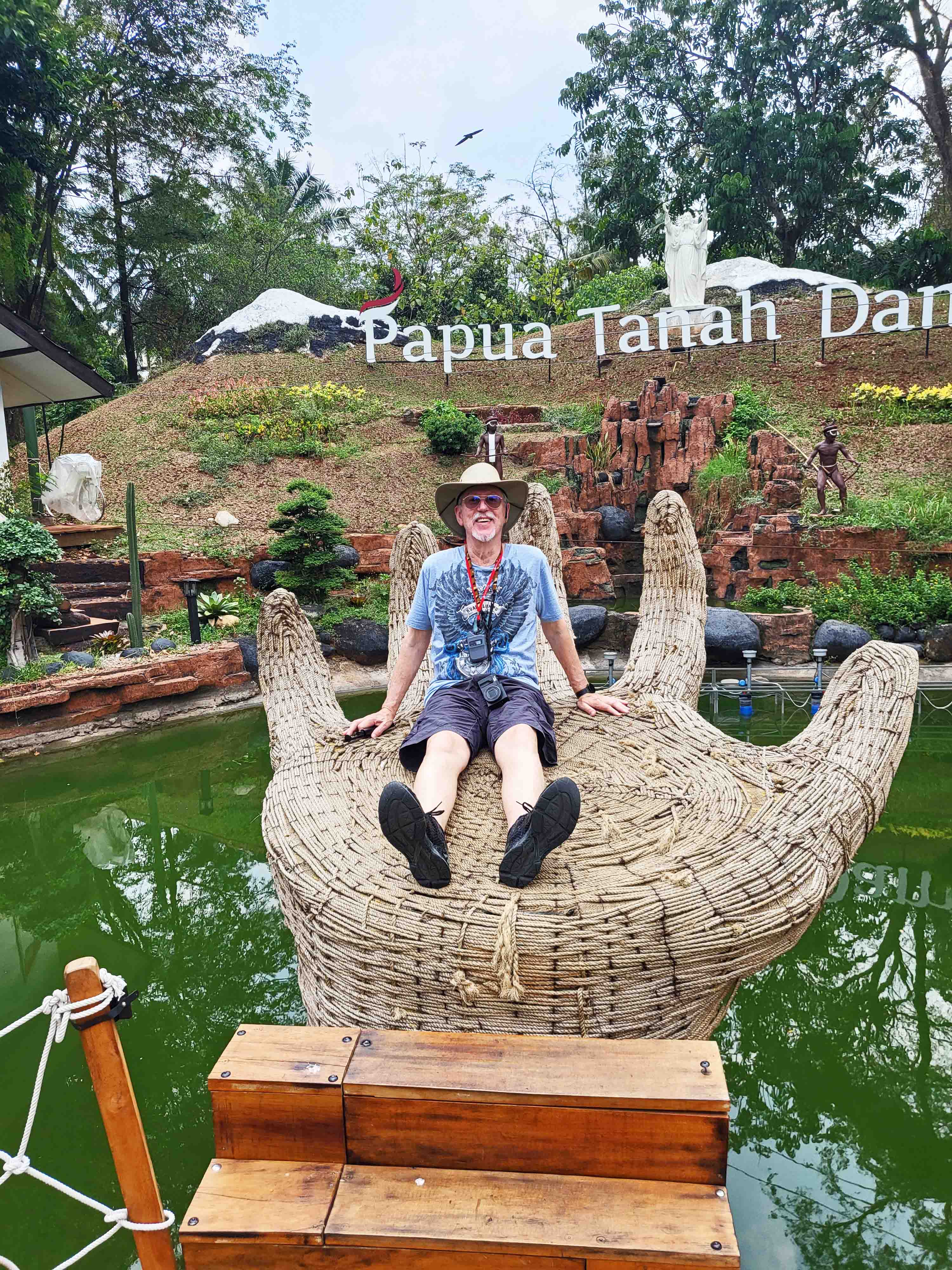 Bill in giant rattan hand in Museum Indonesia
